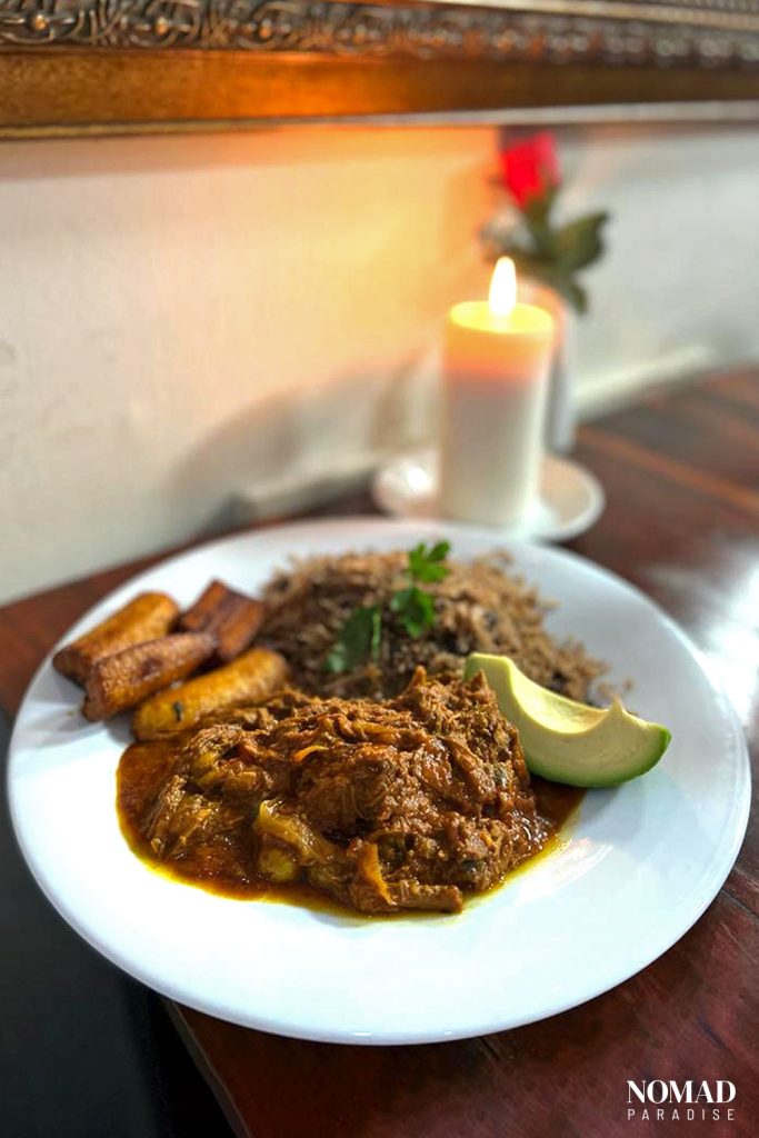Ropa Vieja with plantains, avocado and rice.