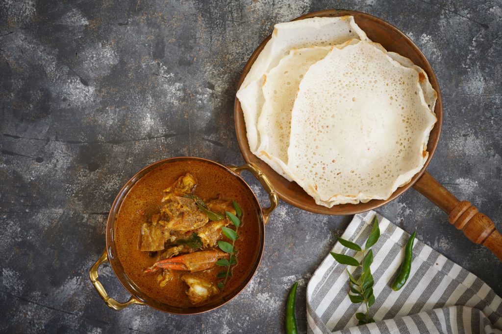Appam and crab curry.