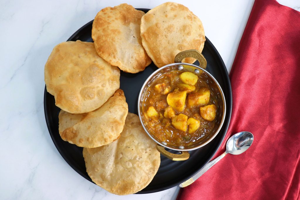 Puri served with potato curry.