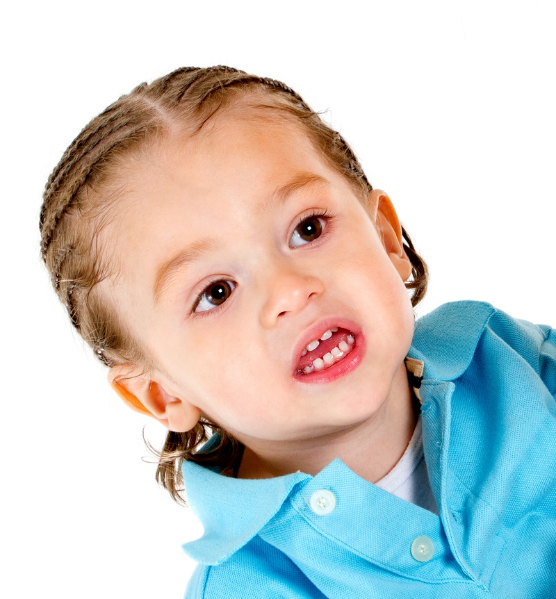 little boy with middle parted braids