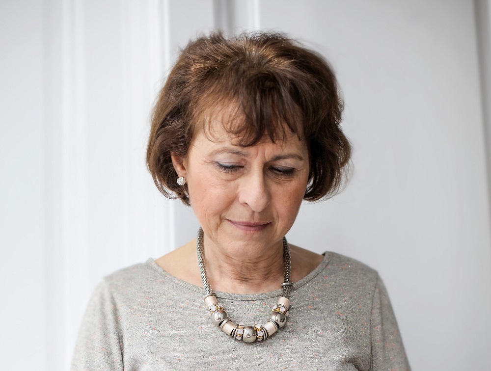 older woman with brunette bob