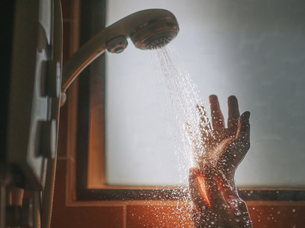 protecting bleached hair from hard water damage - shower filter