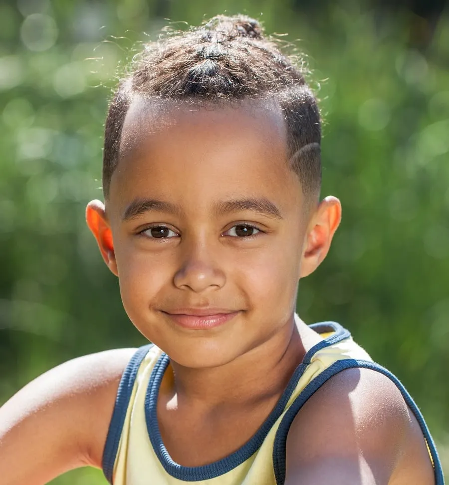 black boy long braided top with short sides