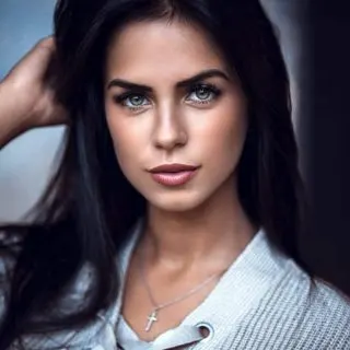 black hair green eyes