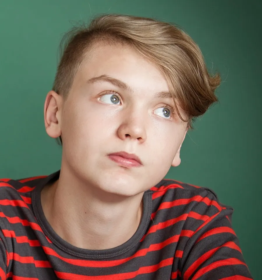 boys long side swept hairstyle with short sides