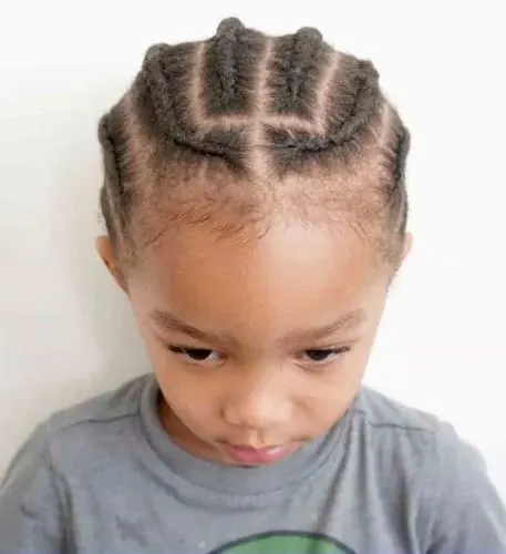 little boy's hairstyle with cornrow