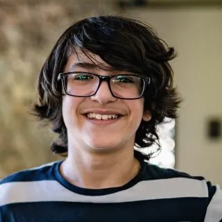 haircut for boys with glasses