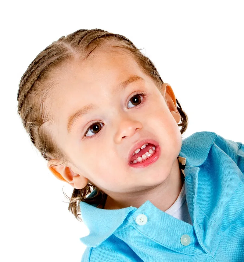 little boy with middle parted braids