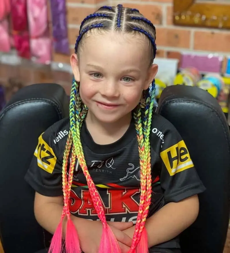little boy's colorful braids