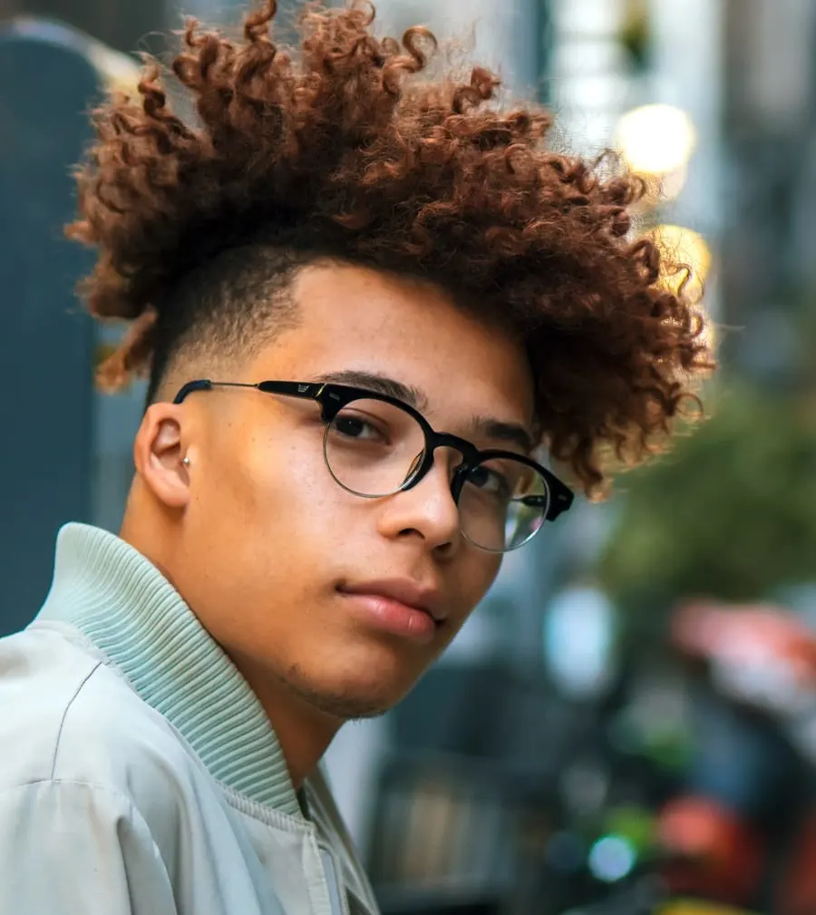long curly hair with mid fade
