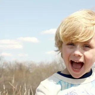little boy with long hair