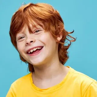 long redhead boy haircut