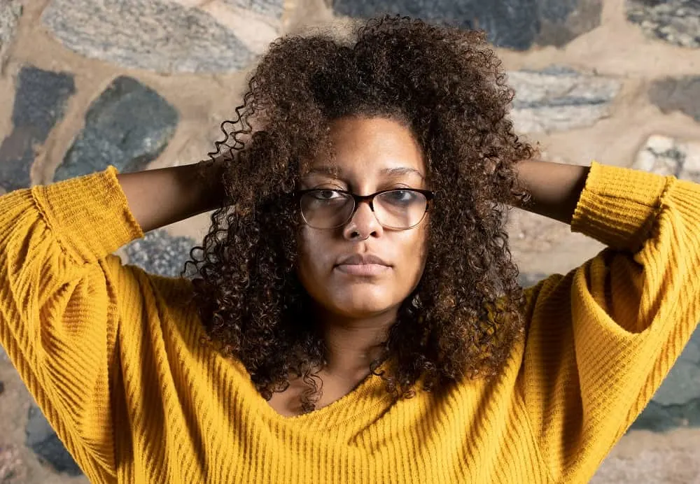 mixed curly hairstyle for women with glasses
