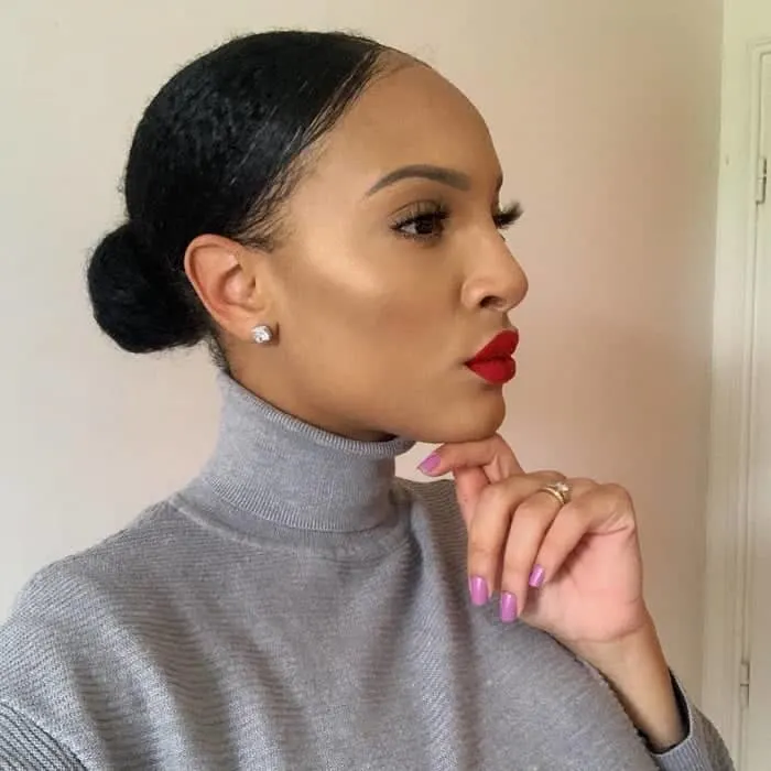 mixed girl with curly low bun