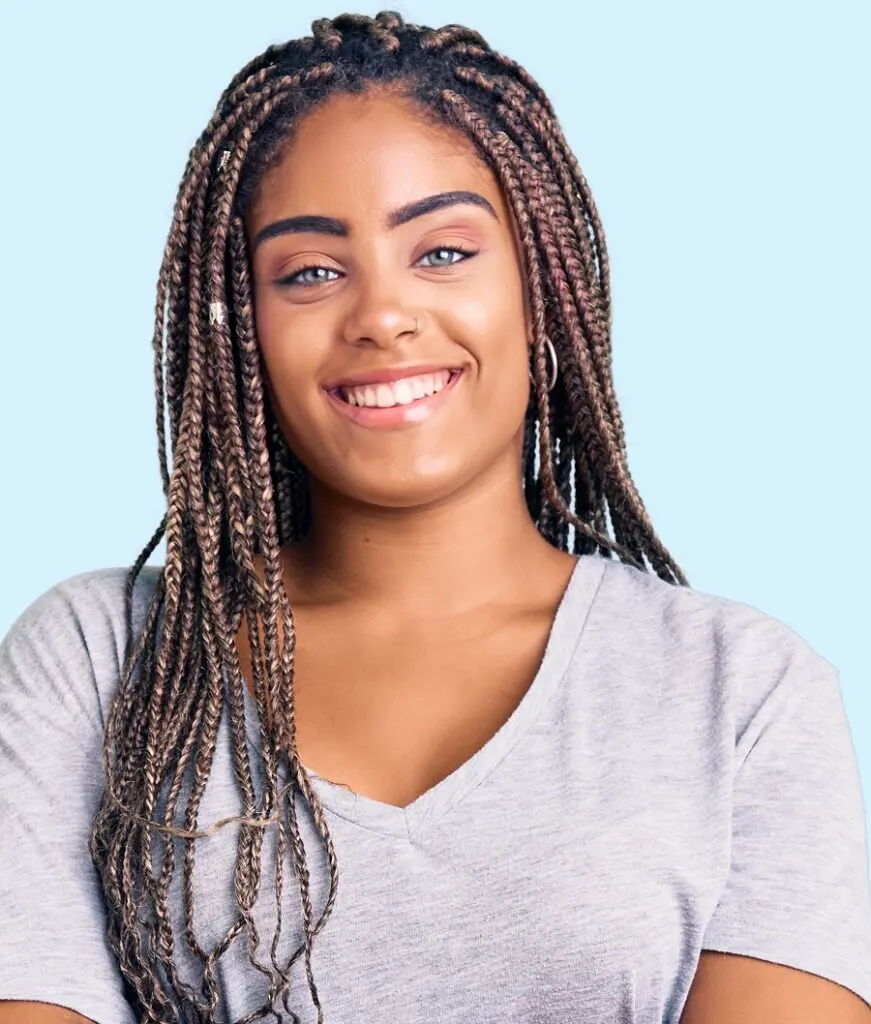 mixed girl curly hair with braids and beads