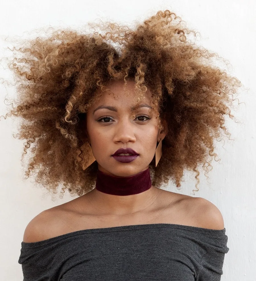 mixed girl with caramel brown curly hair