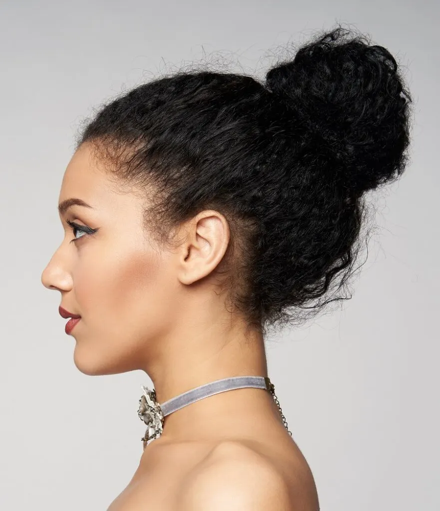 mixed girl with curly bun