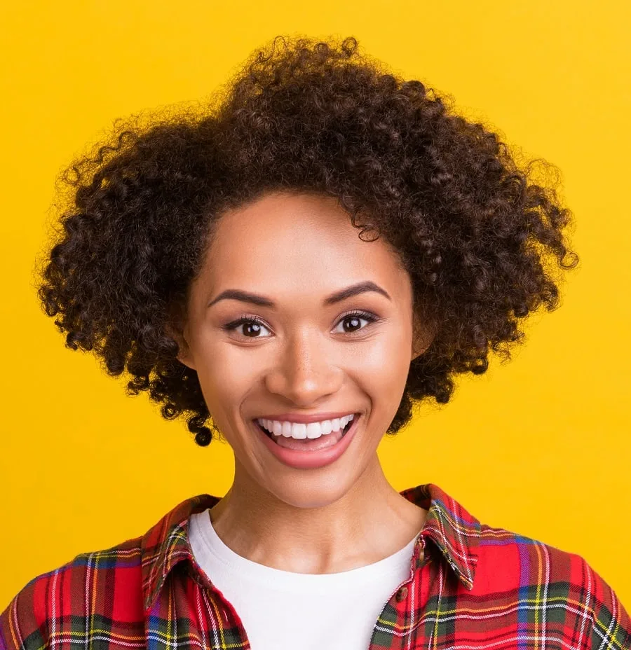 mixed girl with curly layered bob