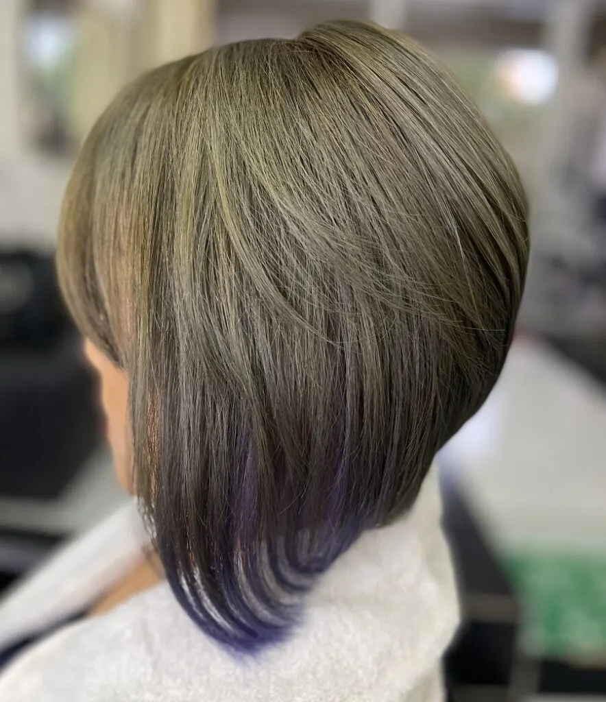 short in back and long in front brunette hair with blue tips